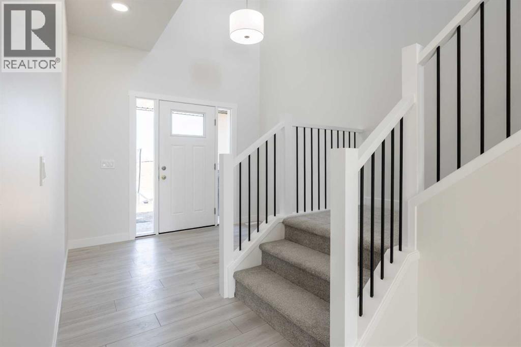 145 Sunstone Way, Balzac, Alberta  T4B 5T5 - Photo 3 - A2261463