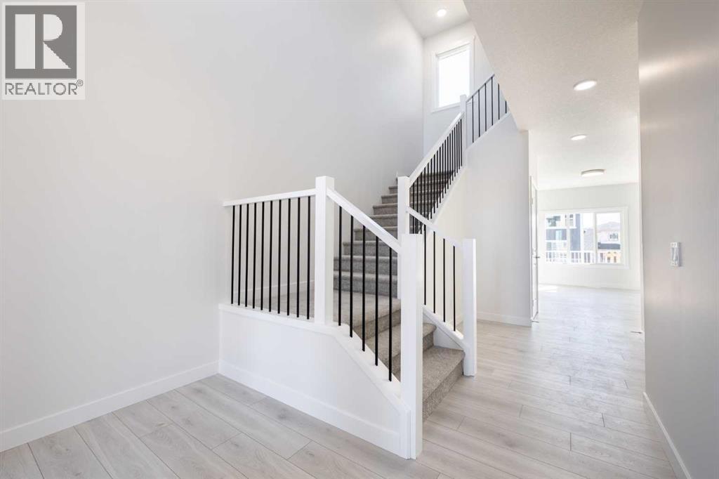 145 Sunstone Way, Balzac, Alberta  T4B 5T5 - Photo 4 - A2261463