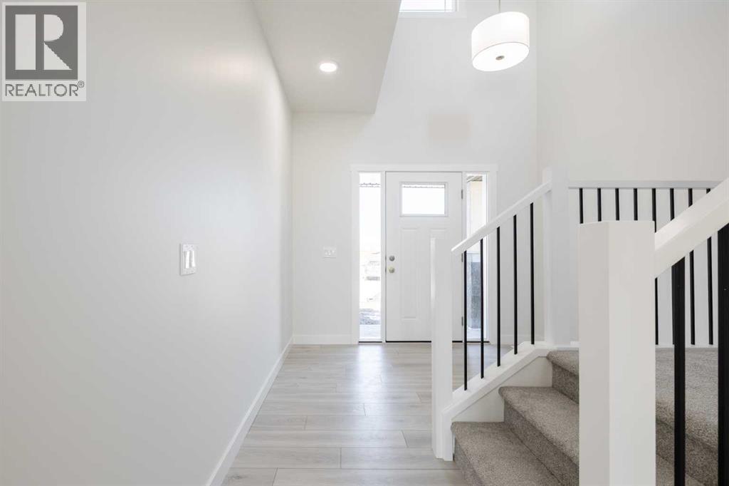 145 Sunstone Way, Balzac, Alberta  T4B 5T5 - Photo 2 - A2261463