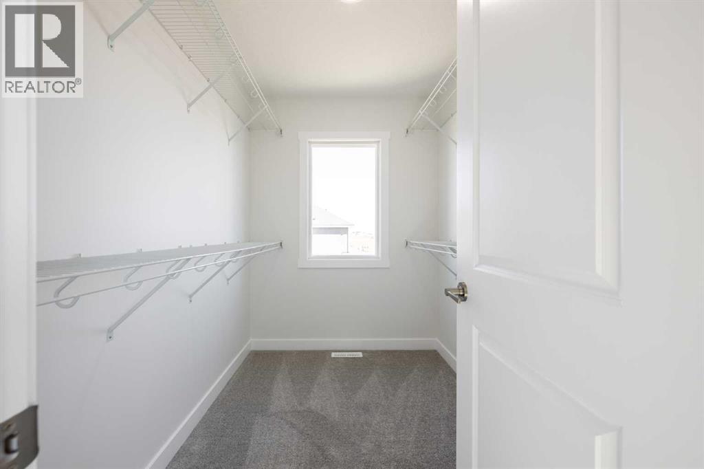 145 Sunstone Way, Balzac, Alberta  T4B 5T5 - Photo 31 - A2261463