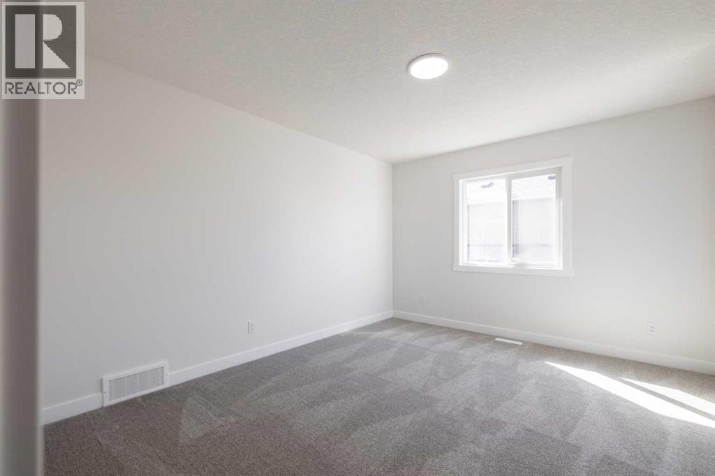 145 Sunstone Way, Balzac, Alberta  T4B 5T5 - Photo 38 - A2261463