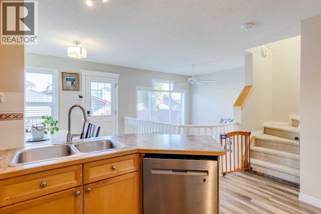 85 Crystal Shores Crescent, Okotoks, Alberta  T1S 2B5 - Photo 9 - A2266485