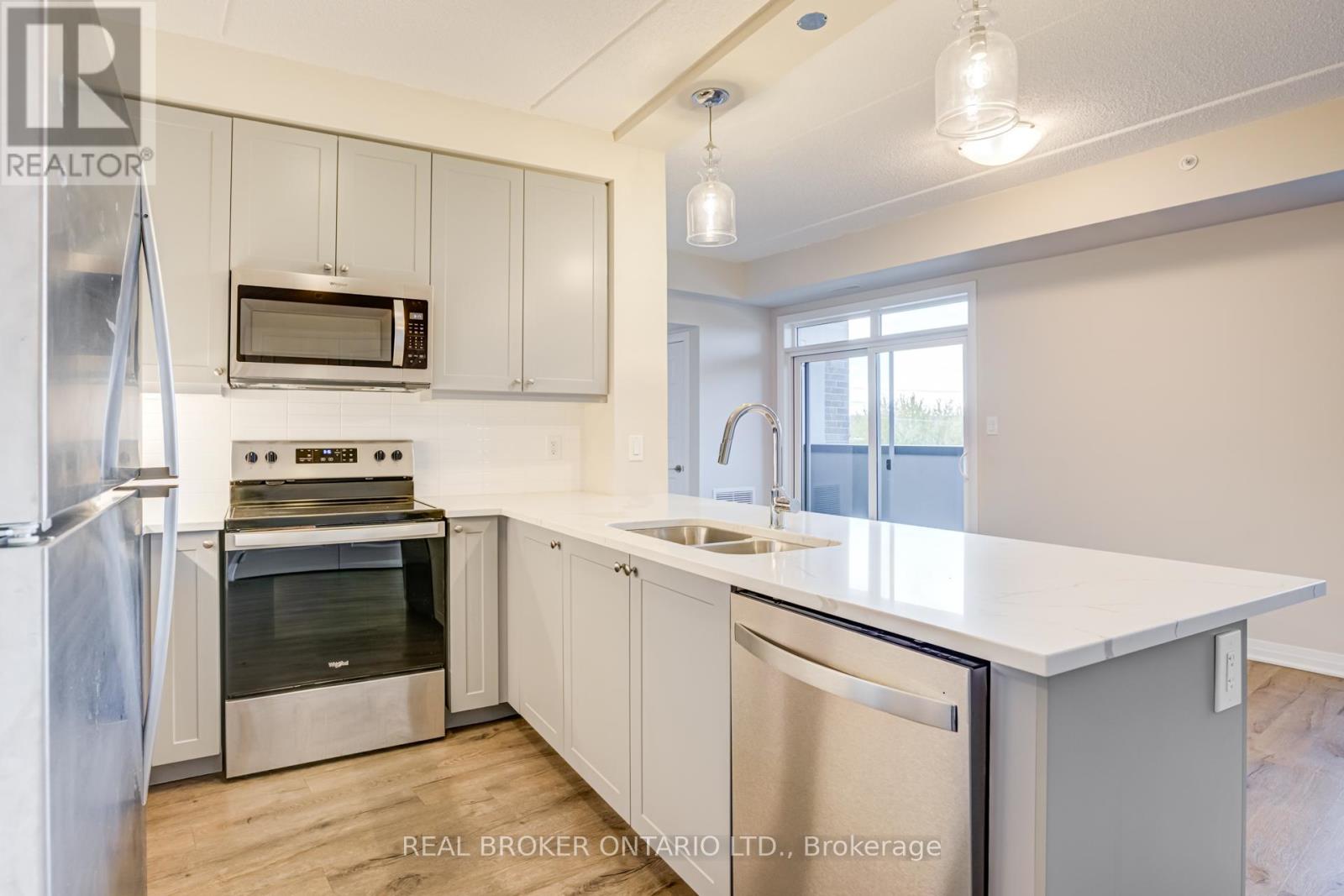 410 - 610 Farmstead Drive, Milton, Ontario  L9T 8X5 - Photo 13 - W12505986