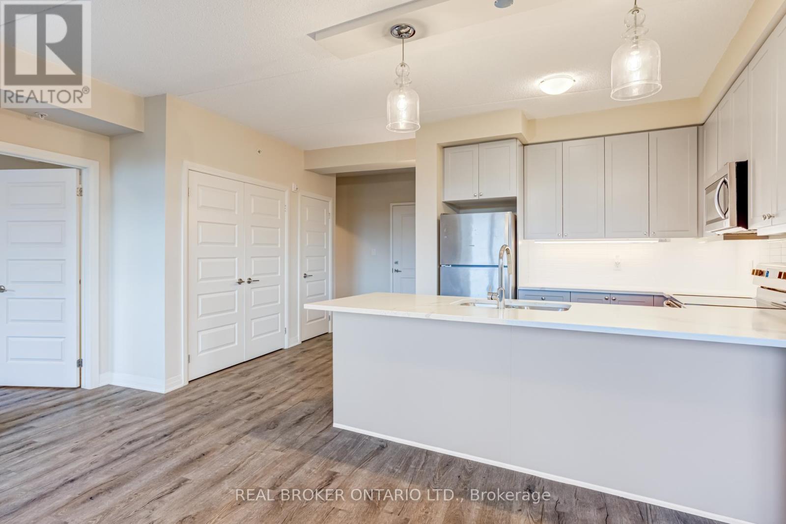 410 - 610 Farmstead Drive, Milton, Ontario  L9T 8X5 - Photo 14 - W12505986