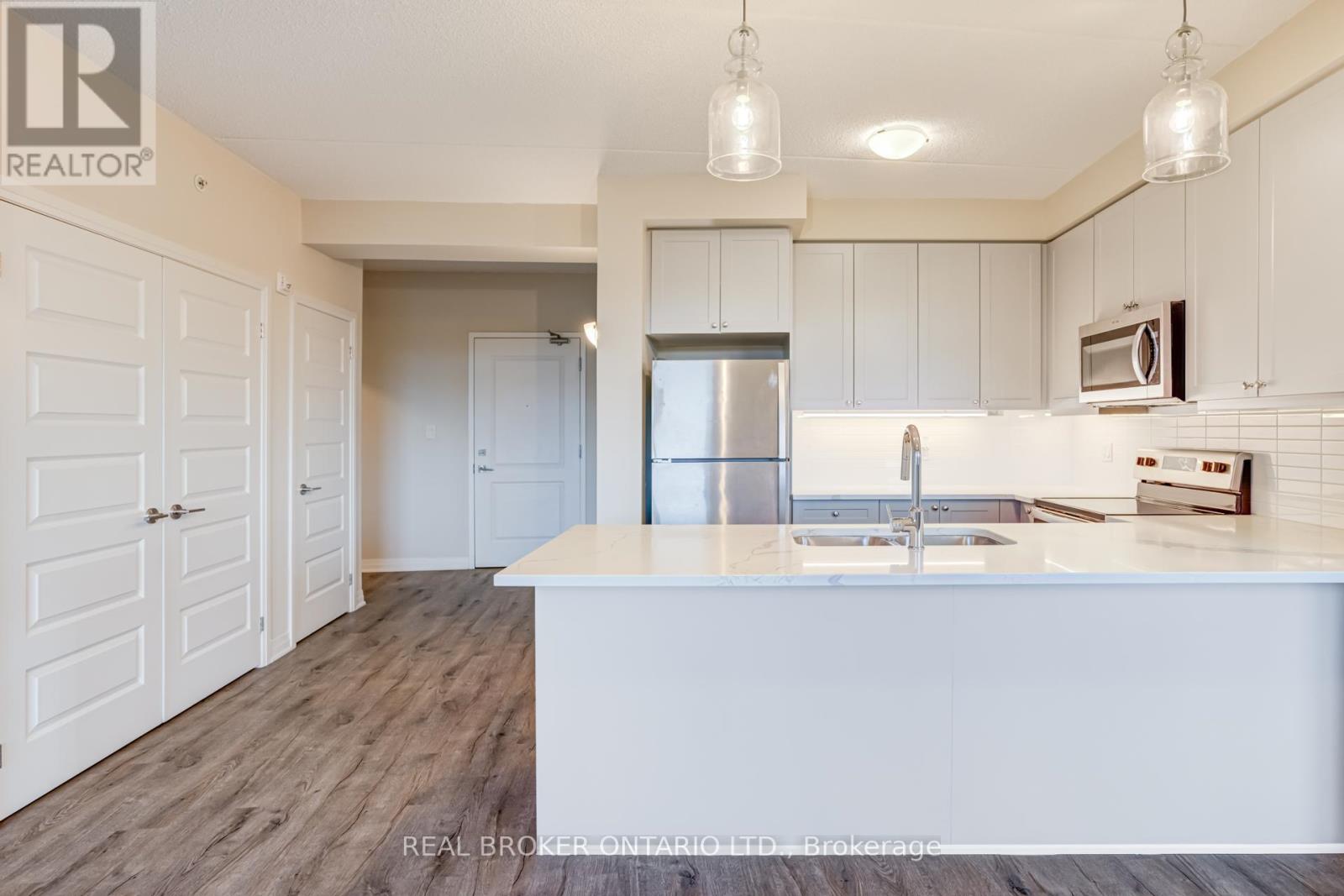 410 - 610 Farmstead Drive, Milton, Ontario  L9T 8X5 - Photo 15 - W12505986