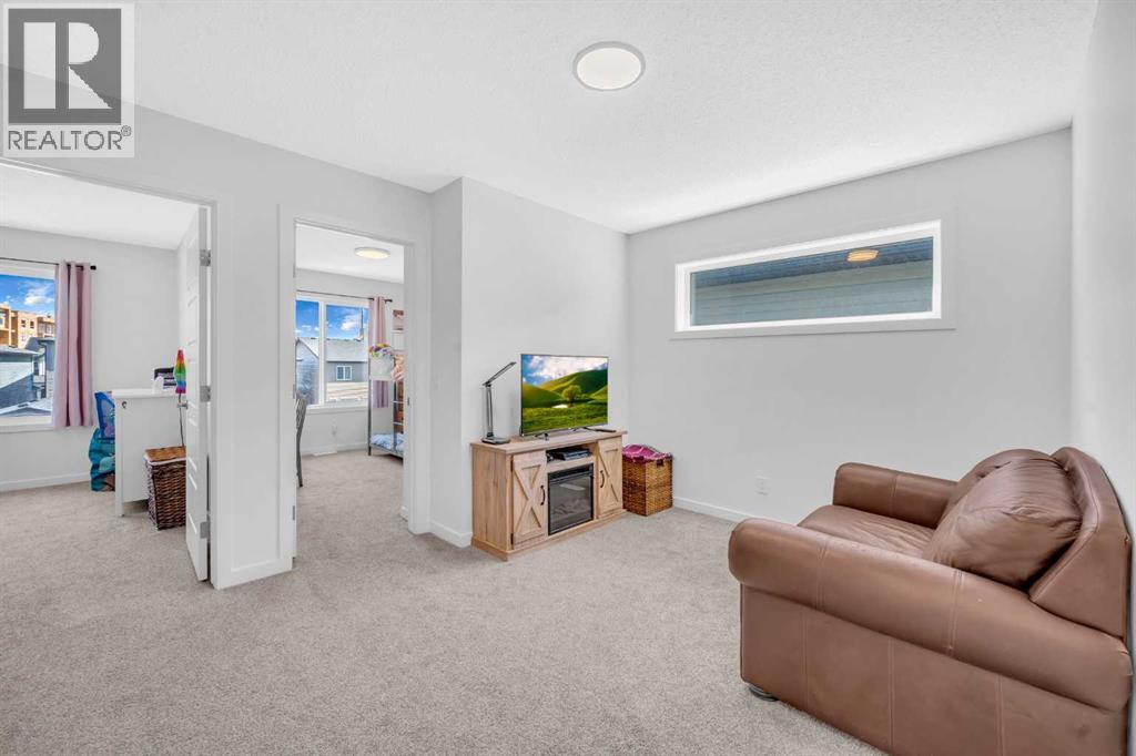 18 Wolf Creek Rise Se, Calgary, Alberta  T2X 4Y9 - Photo 19 - A2261527