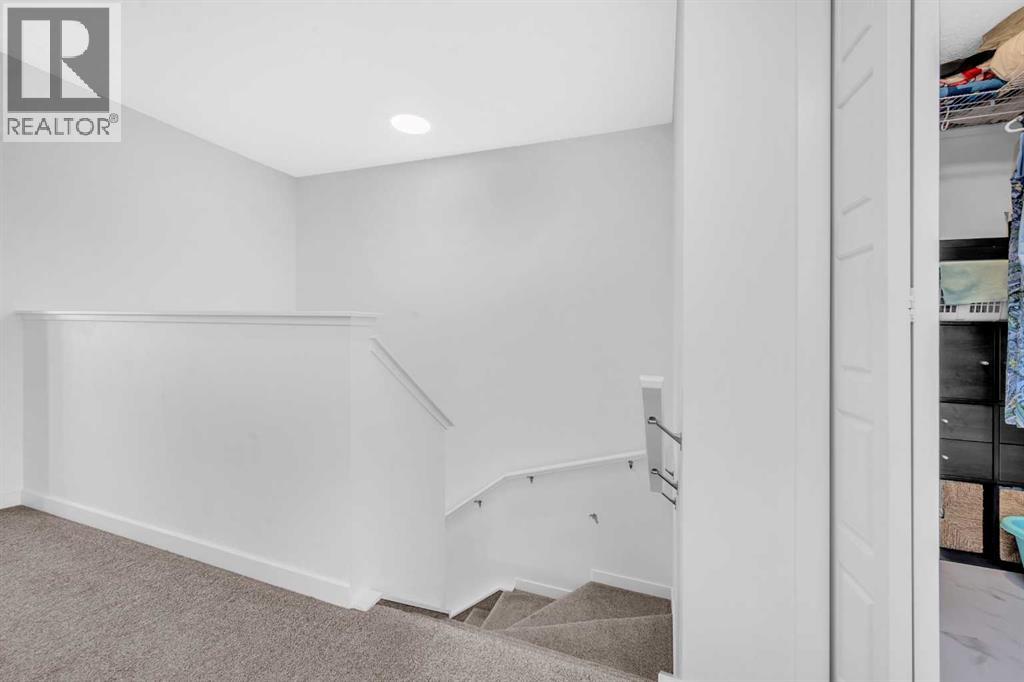 18 Wolf Creek Rise Se, Calgary, Alberta  T2X 4Y9 - Photo 18 - A2261527