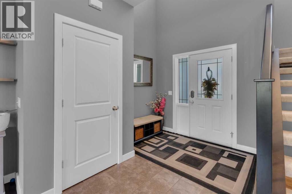 51 Sunset Court, Cochrane, Alberta  T4C 0G3 - Photo 4 - A2266875