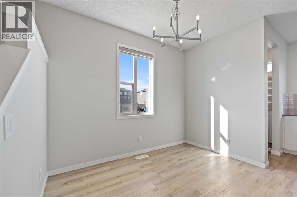 281 Creekside Boulevard Sw, Calgary, Alberta  T2X 4X9 - Photo 7 - A2267008