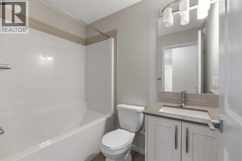 281 Creekside Boulevard Sw, Calgary, Alberta  T2X 4X9 - Photo 15 - A2267008