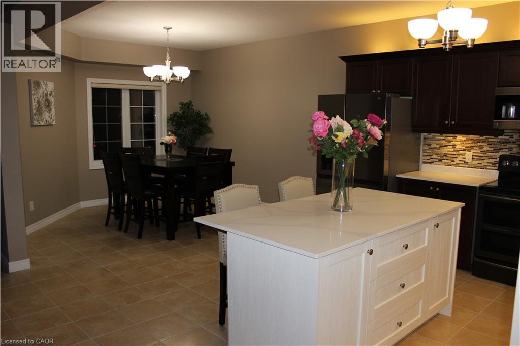 561 Thomas Slee Drive, Kitchener, Ontario  N2P 2Y7 - Photo 8 - 40785346