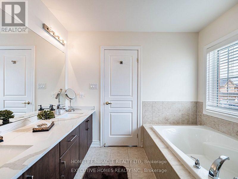 1 Orangeblossom Trail, Brampton, Ontario  L6X 3B4 - Photo 18 - W12499380