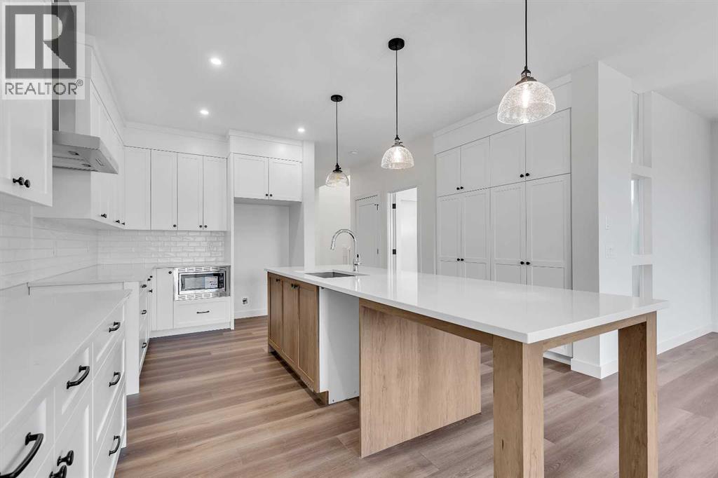 127 Heritage Court, Cochrane, Alberta  T4C 2N4 - Photo 6 - A2268454