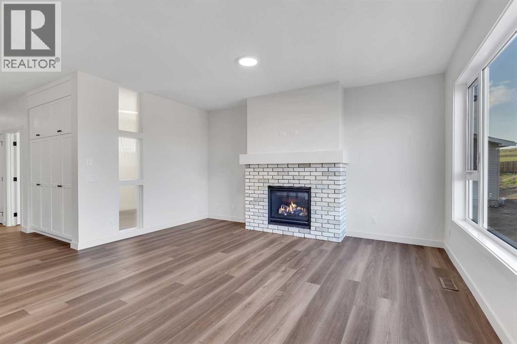 127 Heritage Court, Cochrane, Alberta  T4C 2N4 - Photo 10 - A2268454