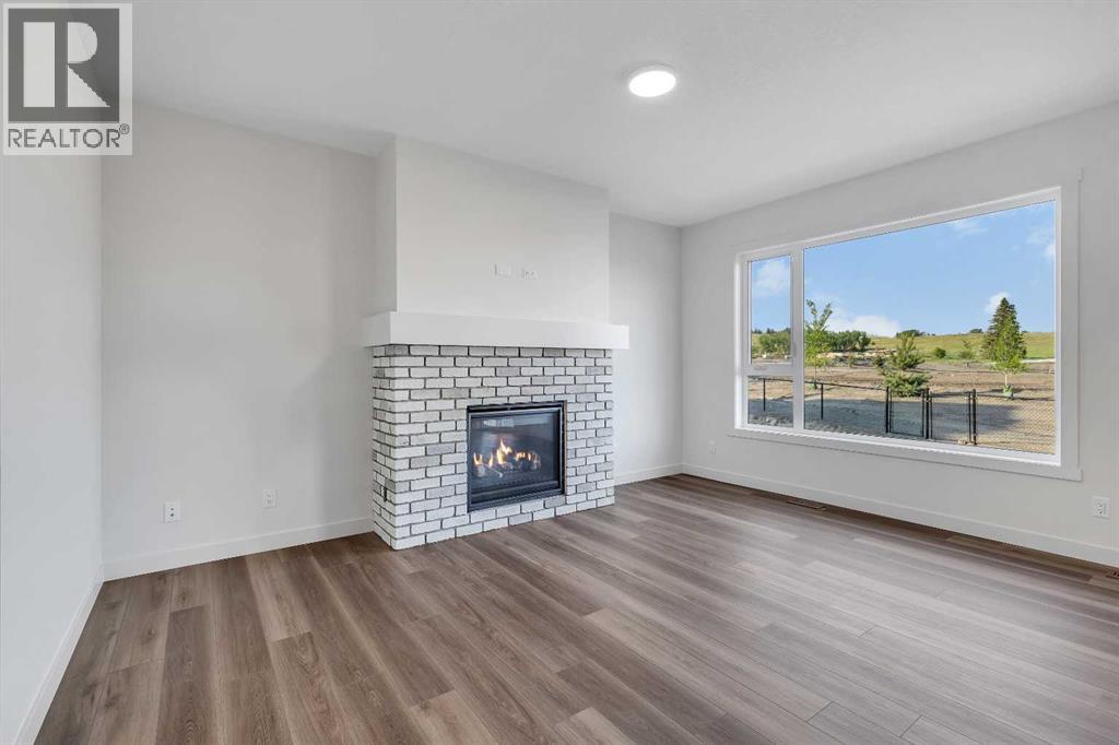 127 Heritage Court, Cochrane, Alberta  T4C 2N4 - Photo 8 - A2268454