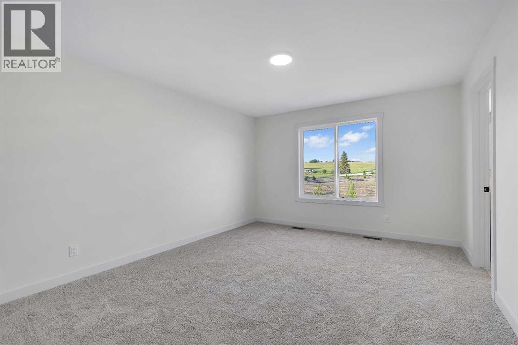 127 Heritage Court, Cochrane, Alberta  T4C 2N4 - Photo 23 - A2268454