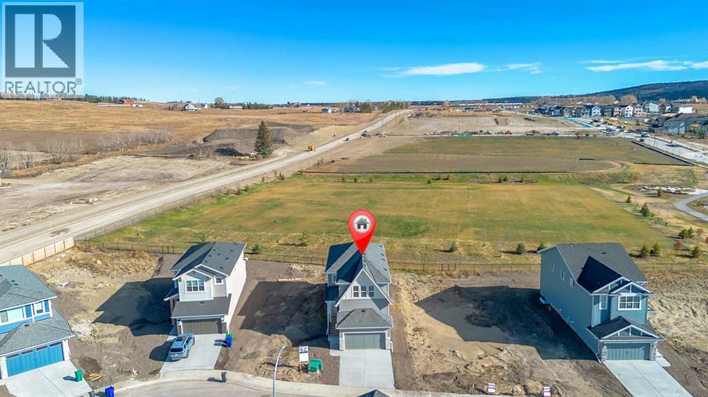 127 Heritage Court, Cochrane, Alberta  T4C 2N4 - Photo 46 - A2268454