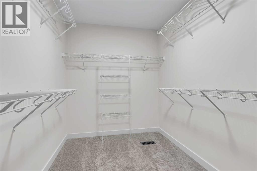 127 Heritage Court, Cochrane, Alberta  T4C 2N4 - Photo 30 - A2268454