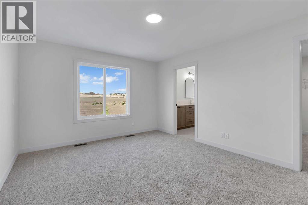 127 Heritage Court, Cochrane, Alberta  T4C 2N4 - Photo 24 - A2268454