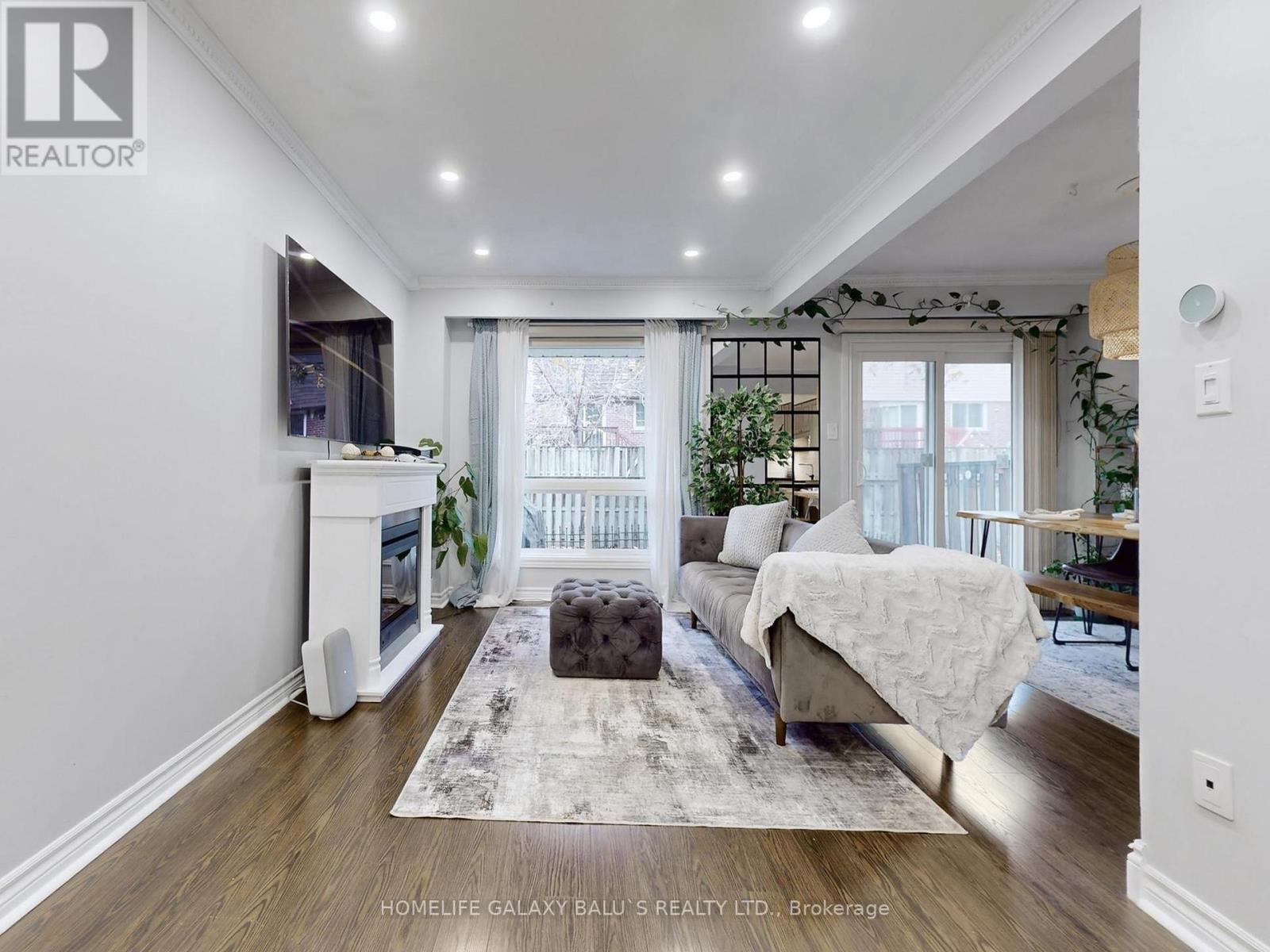 65 - 830 Stainton Drive, Mississauga, Ontario  L5C 2Z3 - Photo 2 - W12501426