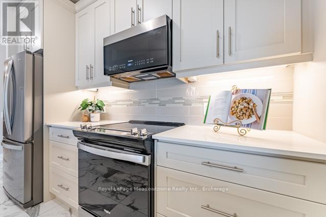 422 - 830 Megson Terrace, Milton, Ontario L9T 9M7 - Photo 2 - W12507694