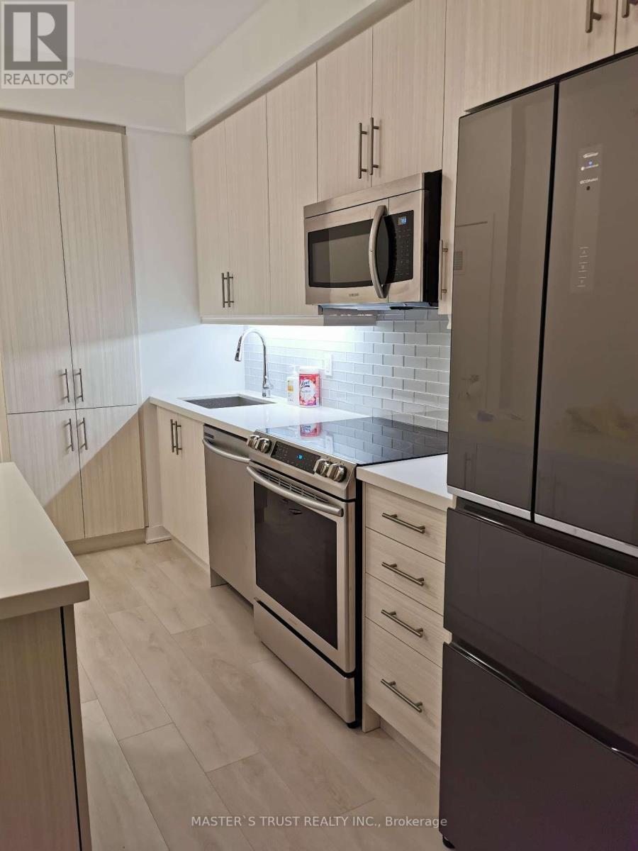 402 - 75 Oneida Crescent, Richmond Hill, Ontario  L4B 0A6 - Photo 4 - N12507496