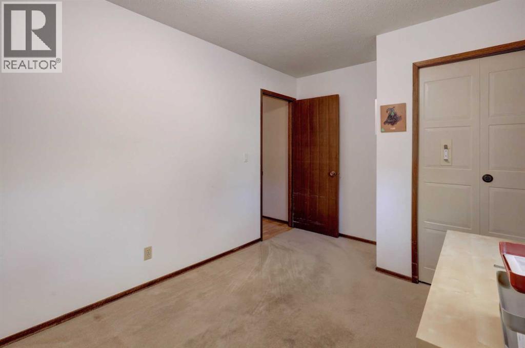 5601 Dalcastle Hill Nw, Calgary, Alberta  T3A 2A2 - Photo 21 - A2251238