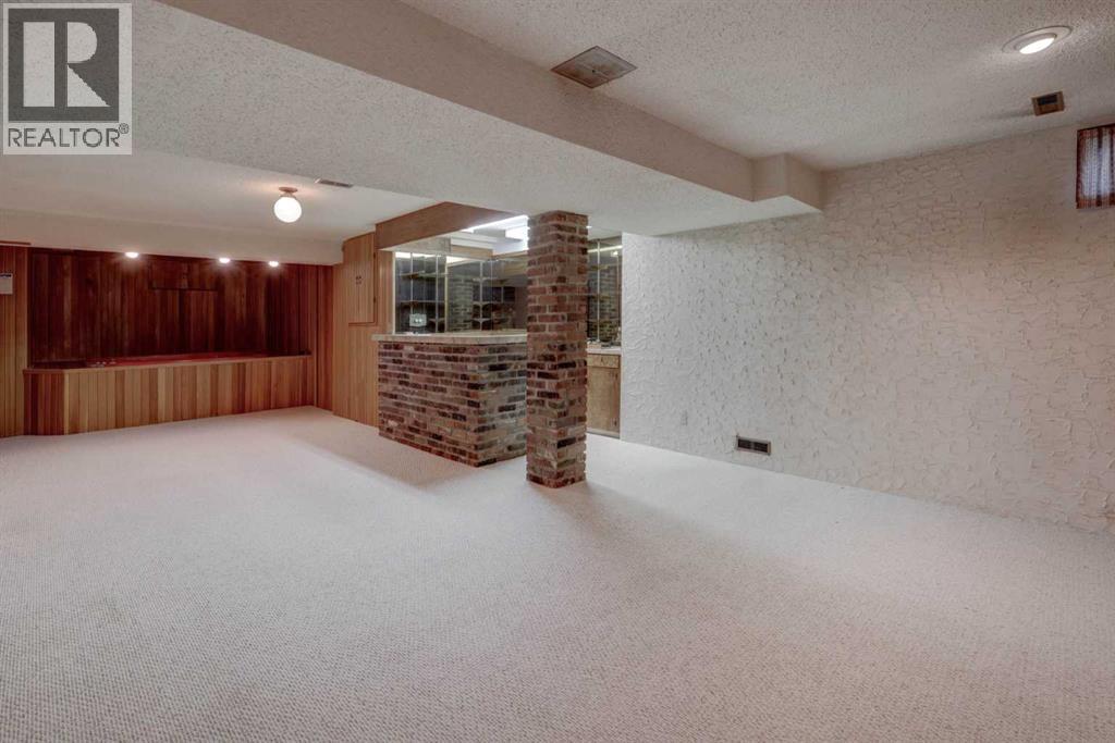 5601 Dalcastle Hill Nw, Calgary, Alberta  T3A 2A2 - Photo 27 - A2251238