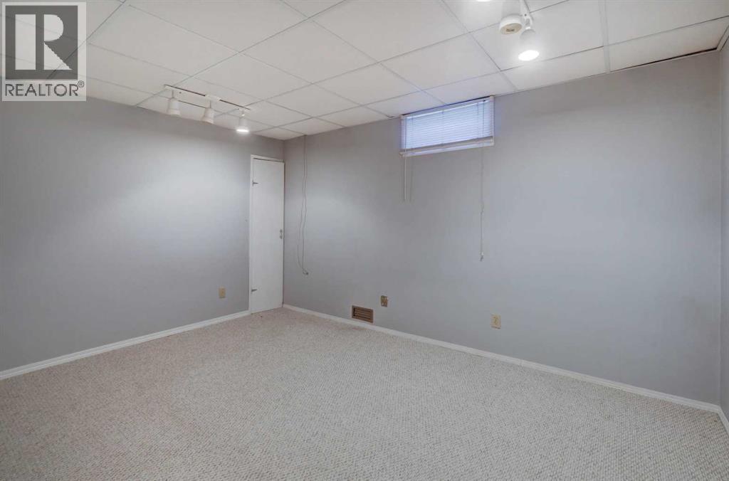 5601 Dalcastle Hill Nw, Calgary, Alberta  T3A 2A2 - Photo 34 - A2251238