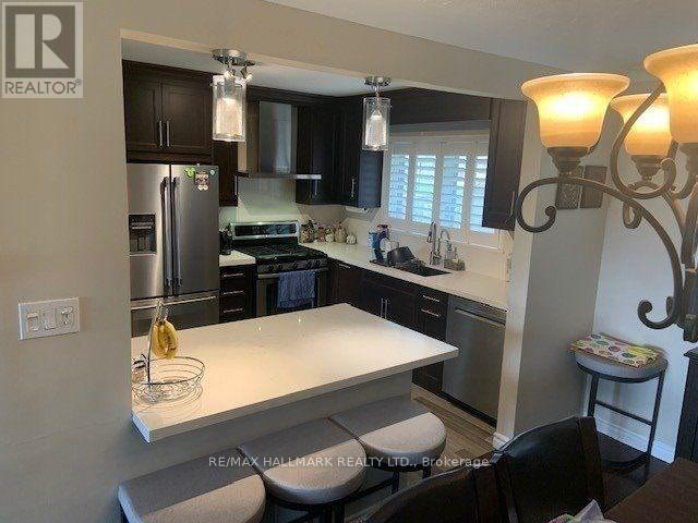 122 Wyndcliff Crescent, Toronto, Ontario  M4A 2K4 - Photo 5 - C12508132