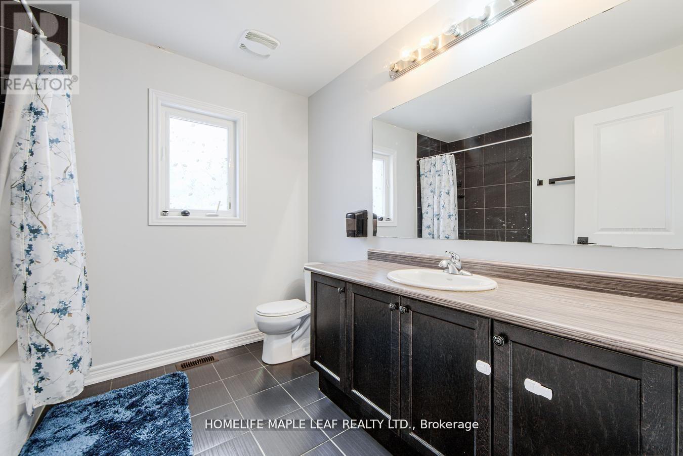 118 Lorne Thomas Place, New Tecumseth, Ontario  L9R 0V8 - Photo 38 - N12508538