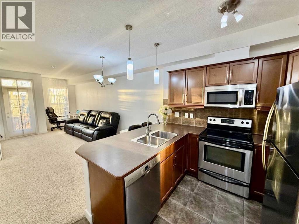 220, 15304 Bannister Road Se, Calgary, Alberta T2X 0M8 - Photo 5 - A2268388