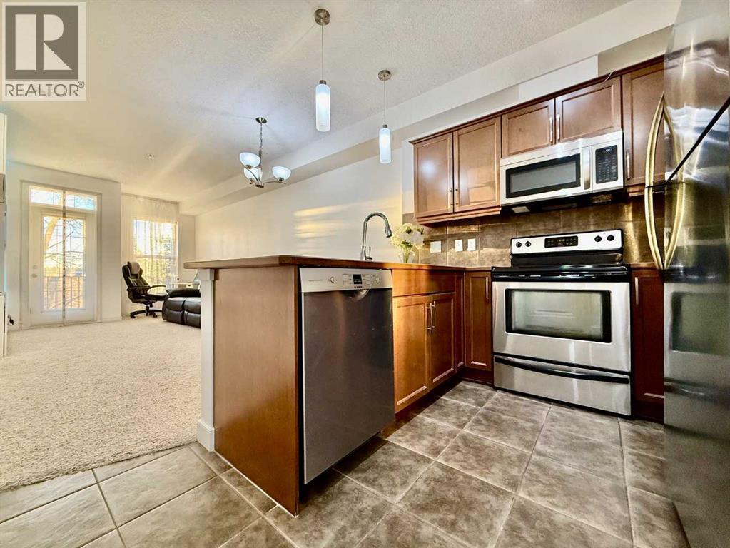 220, 15304 Bannister Road Se, Calgary, Alberta T2X 0M8 - Photo 4 - A2268388