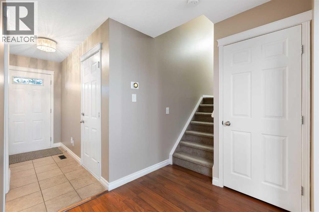 90 Cimarron Trail, Okotoks, Alberta  T1S 2G9 - Photo 6 - A2267796