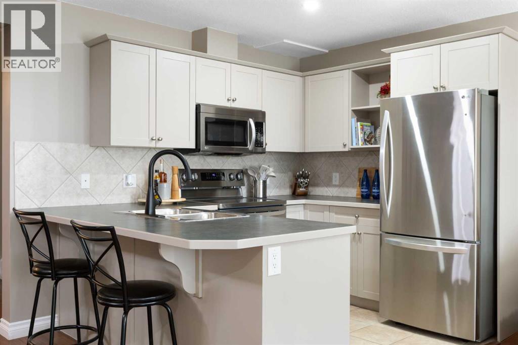 90 Cimarron Trail, Okotoks, Alberta  T1S 2G9 - Photo 18 - A2267796