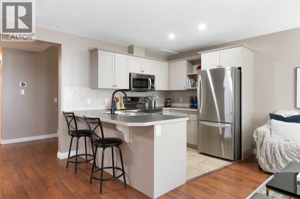 90 Cimarron Trail, Okotoks, Alberta  T1S 2G9 - Photo 10 - A2267796