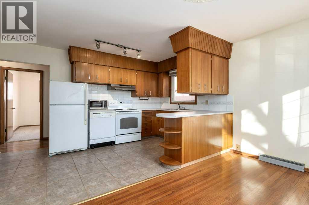 411 10 Street Ne, Calgary, Alberta  T2E 4M2 - Photo 10 - A2266294