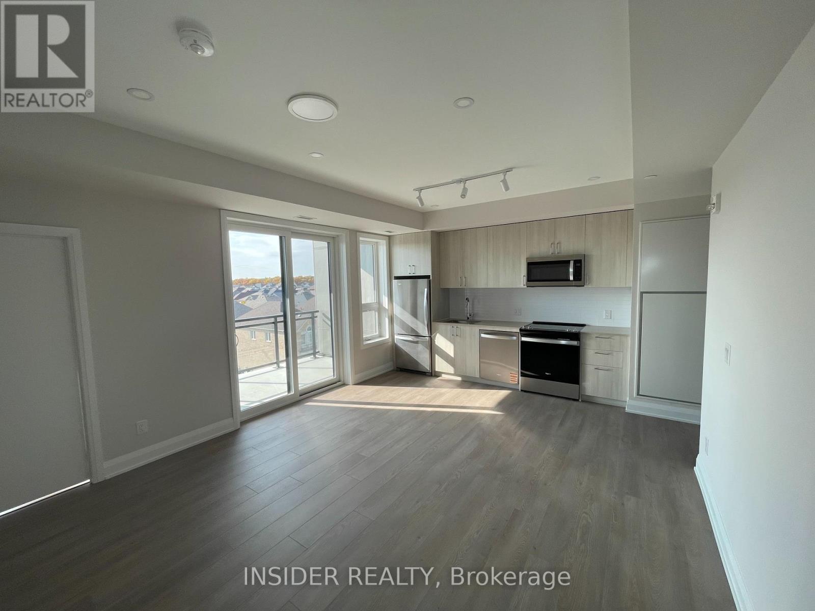 433 - 3250 Carding Mill Trail, Oakville, Ontario  L6M 0Z3 - Photo 2 - W12509776