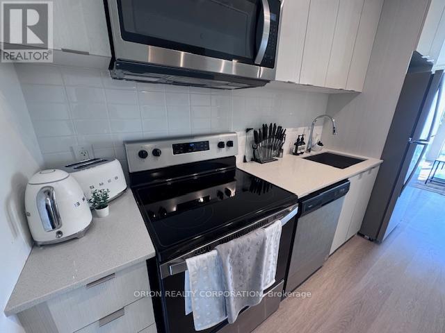 610 - 859 The Queensway, Toronto, Ontario  M8Z 1N8 - Photo 2 - W12509860