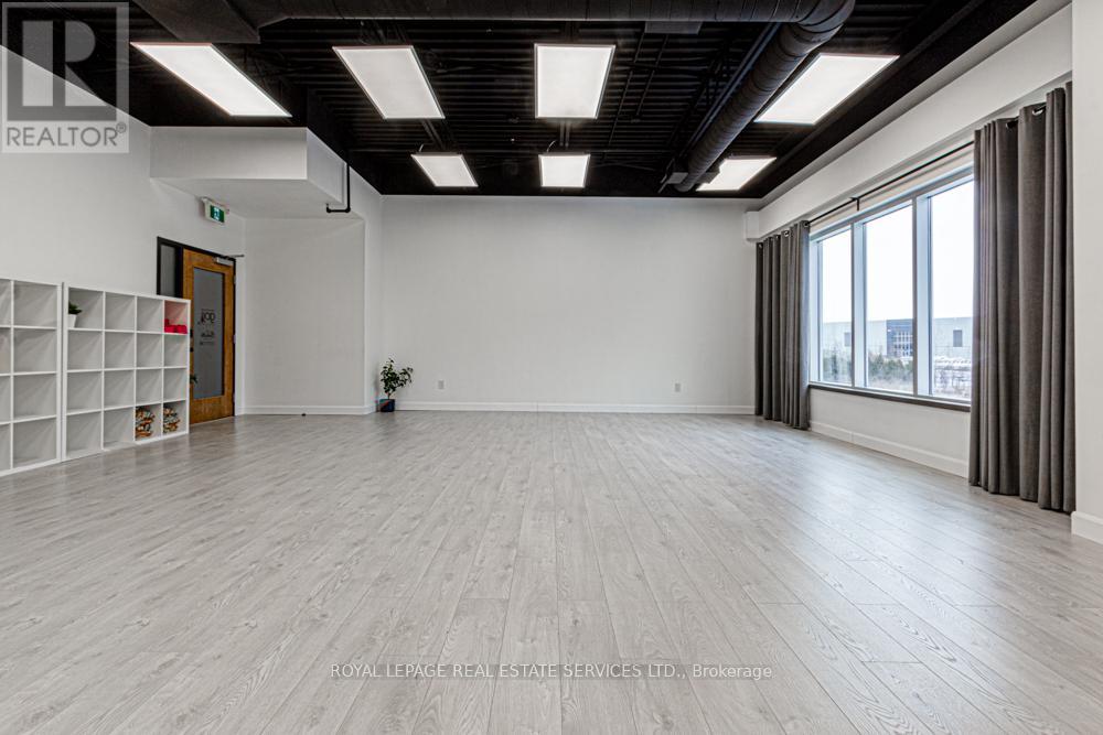 207 - 3475 Rebecca Street, Oakville, Ontario  L6L 6X9 - Photo 5 - W12352786