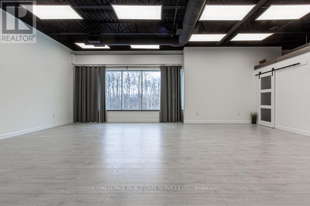 207 - 3475 Rebecca Street, Oakville, Ontario  L6L 6X9 - Photo 3 - W12352786