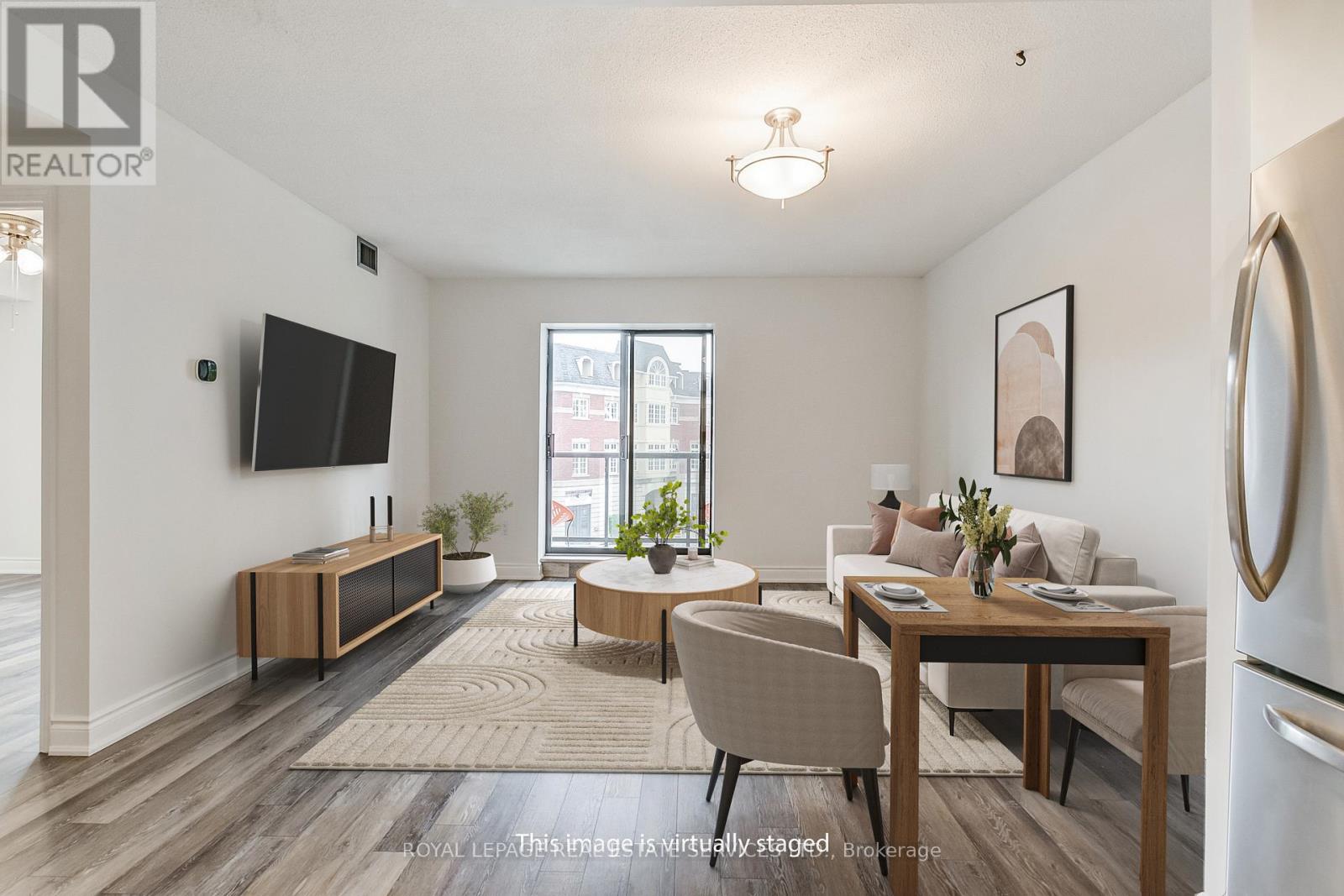 308 - 102 Bronte Road, Oakville, Ontario  L6L 6J5 - Photo 2 - W12510066