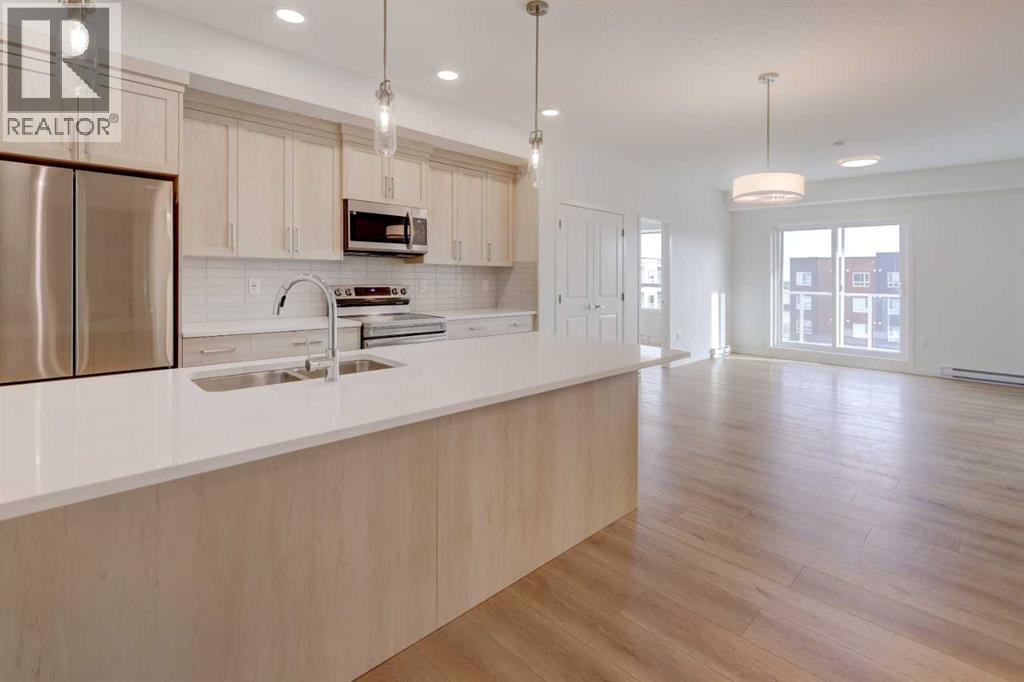 1407, 550 Belmont Street Sw, Calgary, Alberta  T2X 5Y9 - Photo 3 - A2268498