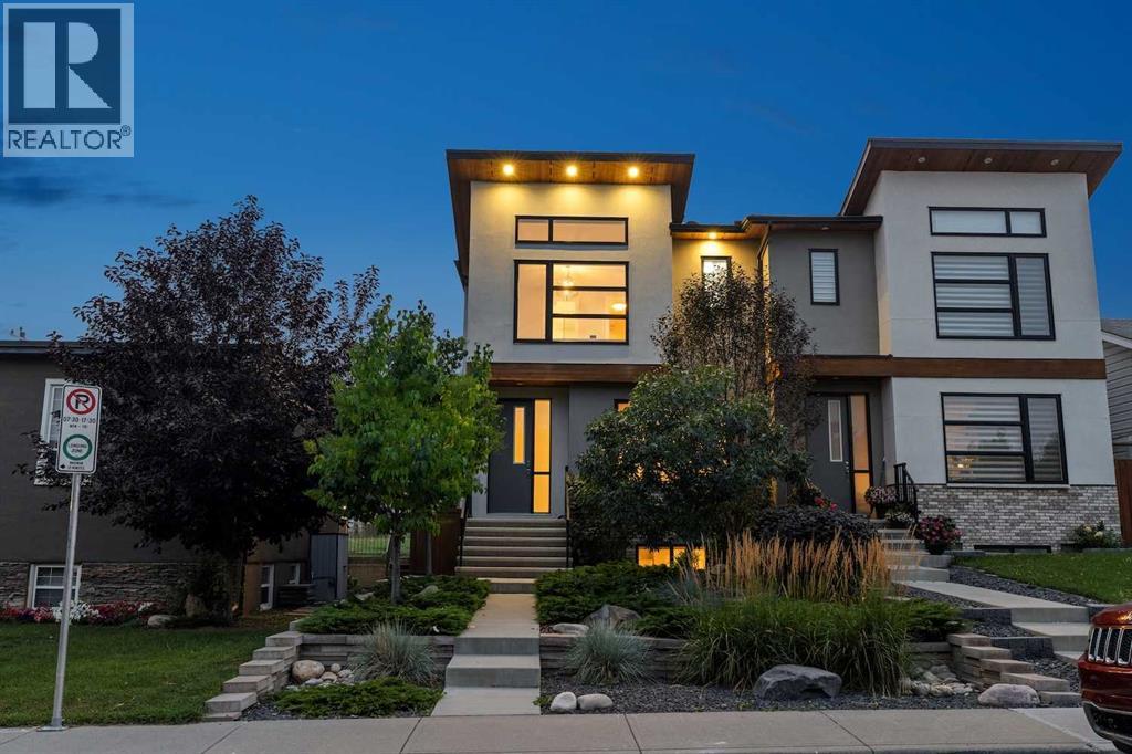 This remarkable inner city home in Killarney truly is an entertainers dream! It starts with a truly massive kitchen with the best of appliances - Jennair oversize built in fridge, gas cooktop, double wall oven, garburator and more compliment the marble counters. The huge marble island is the perfect place to hang out before or after dining in the elegant front dining room. Move out back to the masterfully landscaped stone patio area with an amazing gas fire-pit. The garage has been designed to provide an additional outdoor entertainment area with a door that opens to the patio, it is finished inside and has an epoxy floor - perfect for setting up a bar for the patio or use as a covered entertaining area for BBQ's. Move downstairs and you'll find an amazing, and one of a kind, glass walled wine, whiskey and cigar room - fully sealed and ventilated to the outside. Every box was ticked on this custom build. Upstairs in the owner's retreat is a wonderful marble ensuite with heated floors, soaker tub, and a steam shower with a bench. The walk-in closet is almost 16' long with thoughtful build ins. A few other tidbits - central A/C, silk carpets, heated basement floors - triple pane windows - home automation and much more. This one is a truly unique masterpiece in this market. (id:48254)