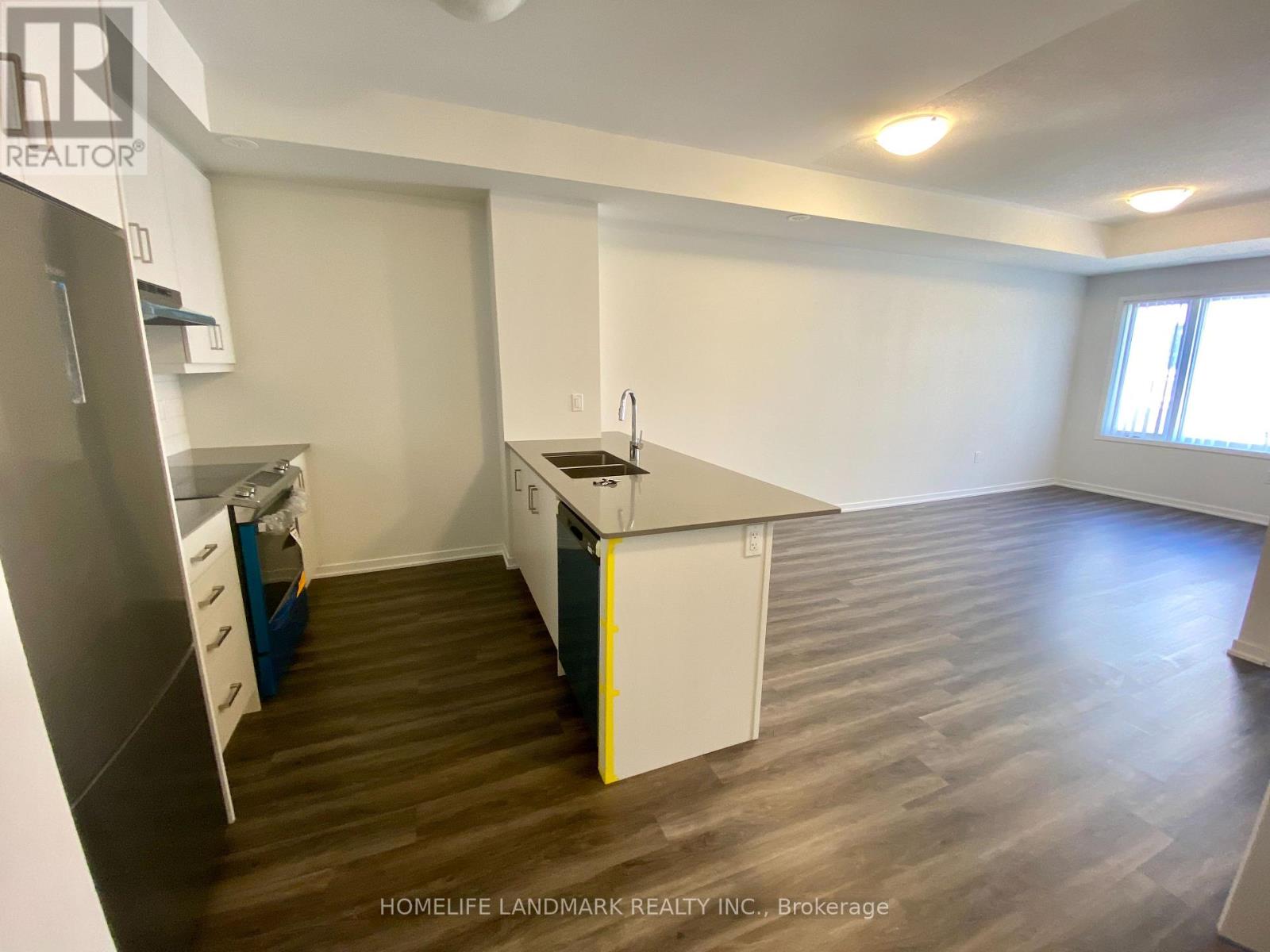 Th223 - 131 Honeycrisp Crescent, Vaughan, Ontario  L4K 0N7 - Photo 3 - N12510172