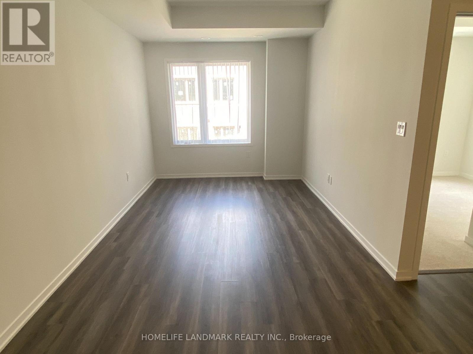 Th223 - 131 Honeycrisp Crescent, Vaughan, Ontario  L4K 0N7 - Photo 4 - N12510172