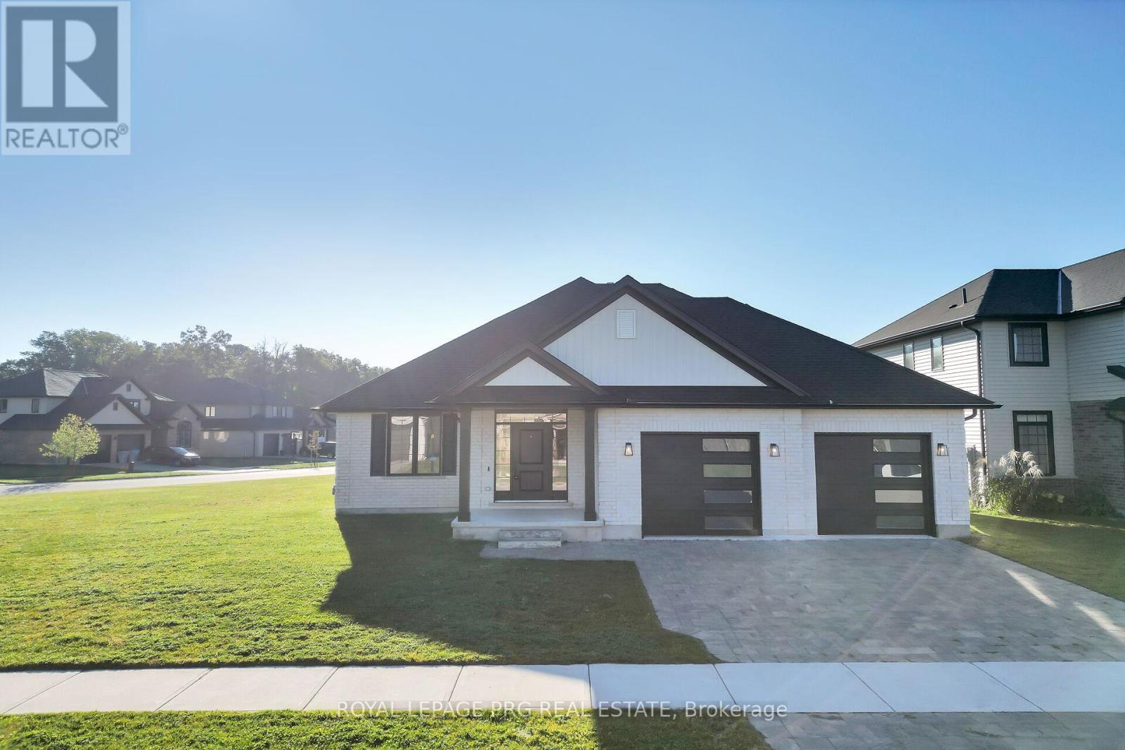 Live in style, on a lot that lets you dream big! Welcome to 649 Tull Street, a spacious 2,278 sq. ft. home sitting proudly on a huge corner lot in the heart of Mount Brydges. Almost like new, this property offers a fresh, modern feel with room inside and out to fit your lifestyle. Whether you've been dreaming of a backyard pool, a workshop for your hobbies, or simply space for the kids to run free this lot makes it possible. Inside, the main floor features a bright and open layout with a kitchen offering plenty of space for cooking, entertaining, and gathering, seamlessly flowing into the dining area and cozy living room with fireplace. A versatile front den gives you the flexibility to create a home office, reading lounge, or even space for a home-based business. You'll also find a convenient powder room on this level, along with the primary suite complete with a large walk-in closet and private ensuite bathroom. Main floor laundry and smart storage add everyday convenience. Upstairs, you'll find three additional bedrooms and a full bath - perfect for family and guests. The lower level is ready for your vision, offering endless potential for a recreation room, gym, or additional living space. Outside, enjoy a double car garage and plenty of parking. Located in the welcoming community of Mount Brydges, this home blends small-town charm with modern conveniences. You're just minutes from parks, schools, local shops, sports complexes, and community trails, with quick access to London and Highway 402. (id:48254)