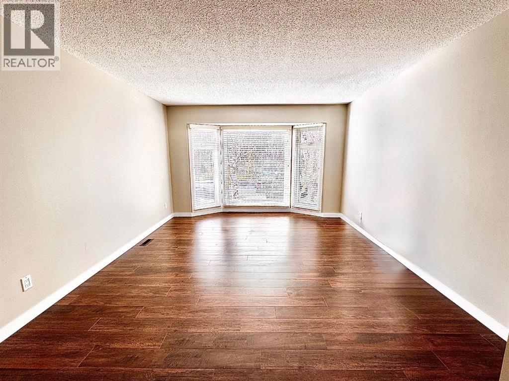 468 Cantrell Drive Sw, Calgary, Alberta  T2W 2K7 - Photo 5 - A2268207