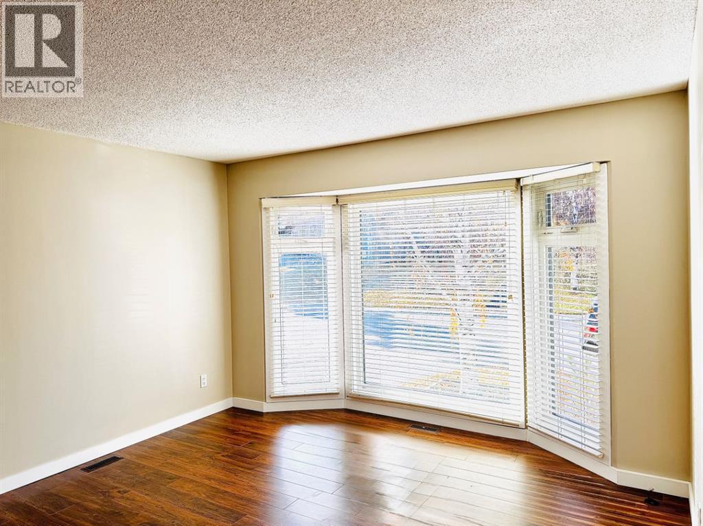 468 Cantrell Drive Sw, Calgary, Alberta  T2W 2K7 - Photo 6 - A2268207