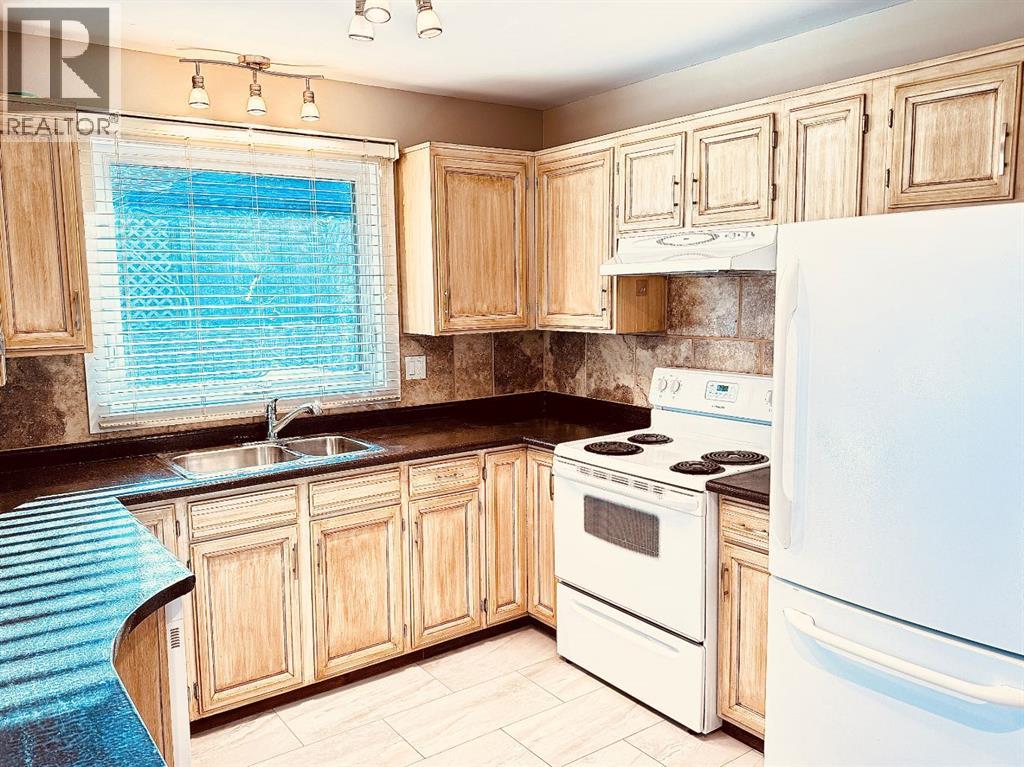 468 Cantrell Drive Sw, Calgary, Alberta  T2W 2K7 - Photo 2 - A2268207